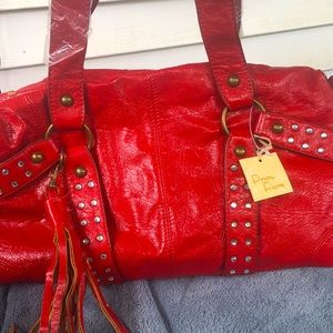Red arm bag from primu fiore brand new tag